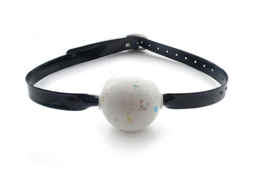 This new improved version of the Patent Pending Jawbreaker Gag is simpler and more colorful that its leather predecessor. Rather than a metal and leather straps. This gag consists of the PVC strap threaded through a plastic tube directly through the candy.