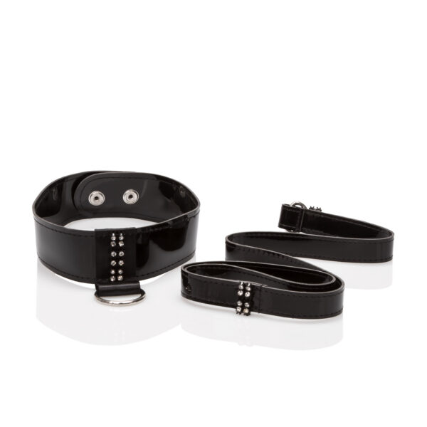 An exquisite collection of seductive fetish gear hand-crafted in soft supple patent leather then adorned with lustrous white crystals. Seductive adjustable 2-snap collar with detachable leash and universal clasp