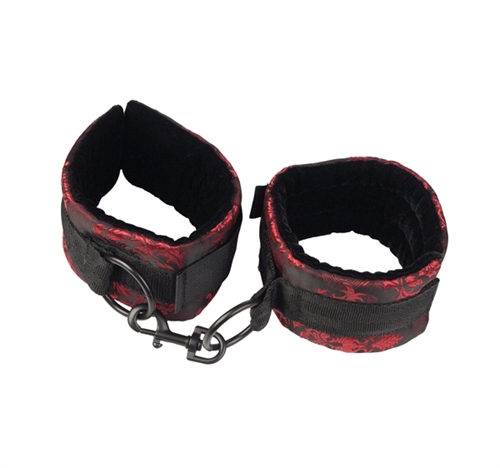 Total surrender to a trusted lover during light bondage play includes being bound and rendered helpless to pleasure. A submissive sexual partner in cuffs is a dominant partners cue to rescue sensations that their partner can only enjoy.