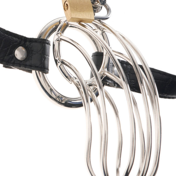 Punish your subjects misbehaved member with the Prisoners steel cock cage chastity belt. Made from high-polished steel and secured with lock and key this shiny chrome chastity cage will keep your subs cock behind bars until ypu decide to set it free. Dare your subject to get a hard on and watch as they struggle inside the prison-like confines of the cage. No matter how aroused he gets the curved steel shape prevents your sub from getting erect nut the open design still allows them the freedom to piss when they need to. You hold the key to pleasure so make sure they do as you say before you grant them in their freedom.