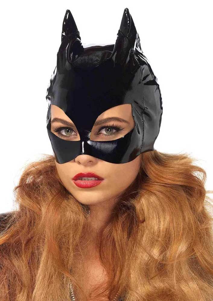 you'll take on an air of mystery when you slip on this wet-look cat mask. This iconic costume mask features a full cap vinyl mask with two pointed ear-like tips and angled eye openings. Complete this comic villainess costume with the Leg Avenue Lame Zipper Front Bodysuit