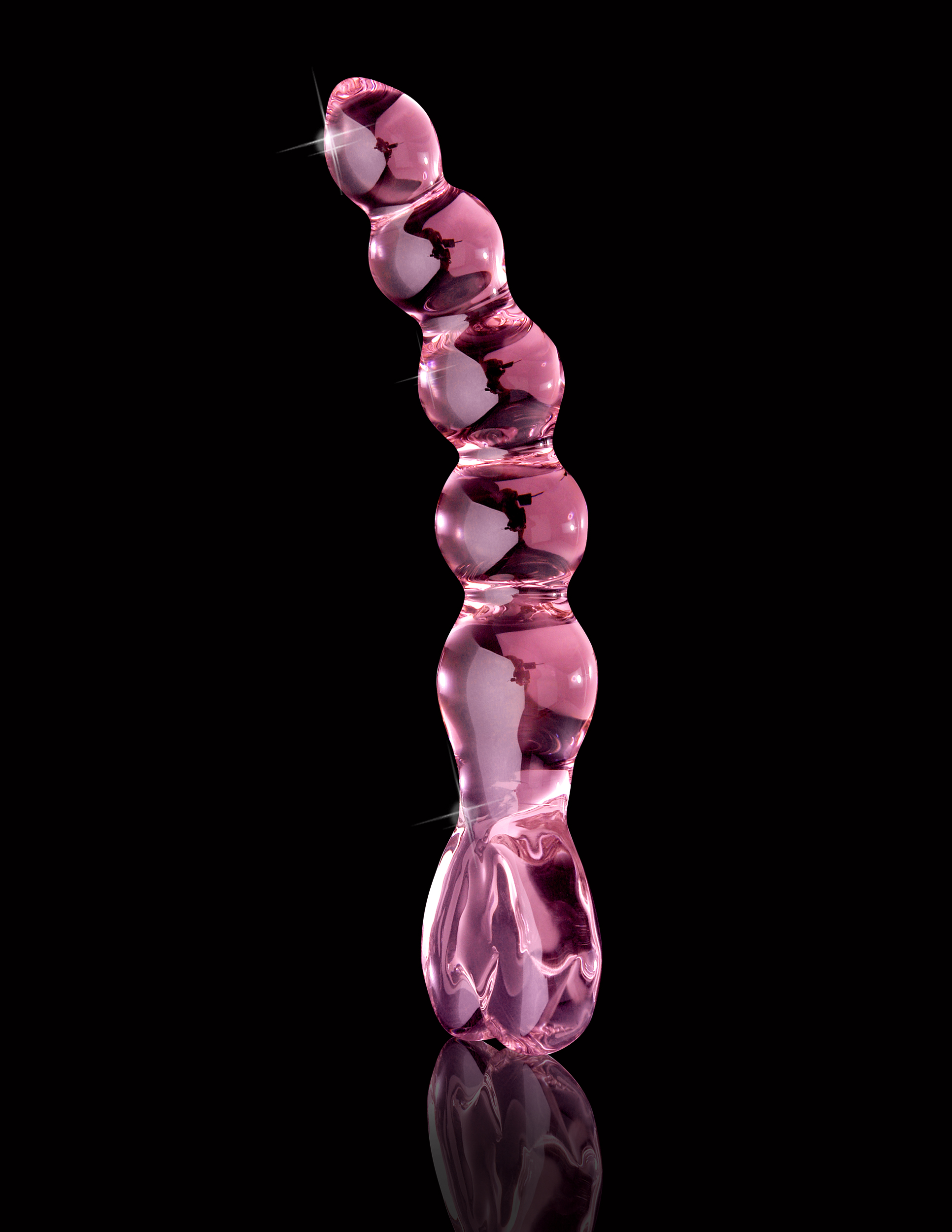 You will be sure to feel the love with this luxurious glass massager. Featuring a tapered tip to ease insertion and a heart shaped-handle for safe and easy handling this beaded shaft offers the ultimate vaginal or anal stimulation. Cleverly curved to hit all the right spots the shaft bends upwards for explosive G-spot and P-spot stimulation. Insertable Length: 6" (15 cm) Width: 1.25" (3.5 cm)