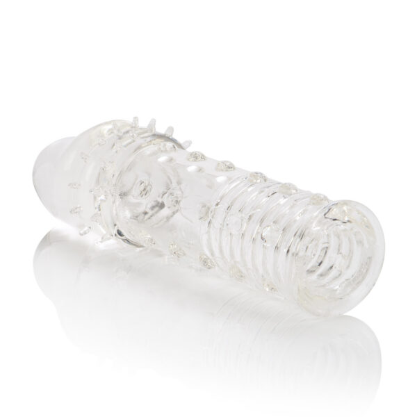 Size does matter!<br><br>That's why the Adonis Extension adds a full 2 inches ( 5 cm) to the length of your penis. This comfortable sleeve is soft and discreet. Featuring sensual ribs and an accentuated penis head for added pleasure. <br><br>15.87 cm. x 3.81 cm.