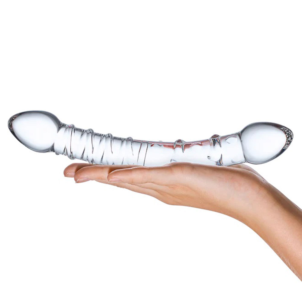 the Double Trouble Glass Dildo is dual- ended with each side offering its own unique flavor of stimulation. One end of the Double Trouble Glass Dildo features a ridge that swirls along the shaft until about halfway. On the other end