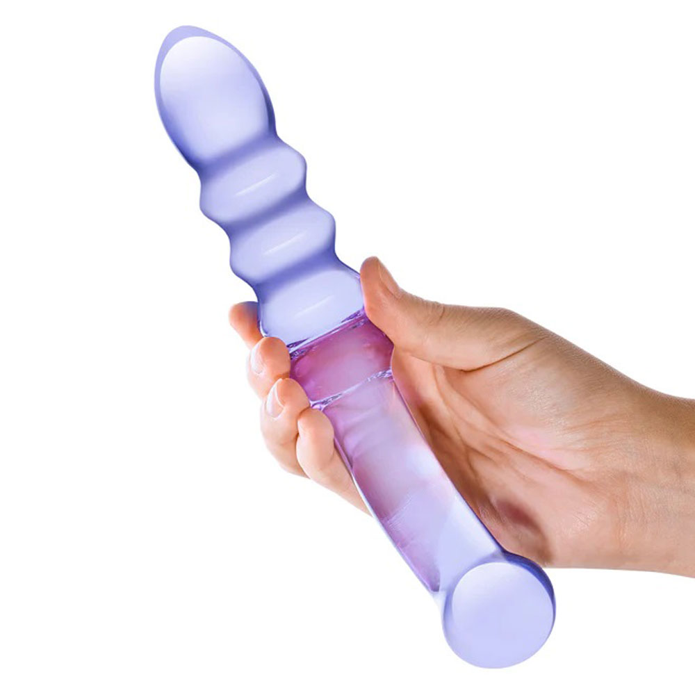 the Purple Rain Ribbed Dildo will have your orgasms raining down effortlessly with its sleek