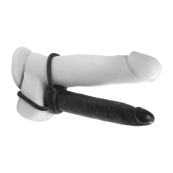 This Double Trouble strap-on allows you to experience the thrill of double penetration without involving another partner. The TPR ring on the top of the shaft acts as a performance-enhancing cock ring while the large bottom ring loops around his balls for a super tight squeeze. The dildo features a tapered tip for easy entry and is completely seamless. Its firm enough so that it wont