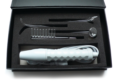The Neon Wand is a popular device line that creates an electrical discharge across the surface of the skin. The electricity produces sensations over a broad range from a pleasurably warm tingling to a more intense focused sensation that some find painful. The level of sensation by the wand can be controlled both by a multi-level intensity dial on the wand itself and also by which electrode you choose to use. The Neon wand kit comes with 4 different glass attachment - Electrode comb Mushroom tube 90 degree Probe Tongue Tube - that will be a thrill to experiment with. The kit color refers to the color of the light glowing in the glass electrodes. Can be used up to 25-30 minutes at a time