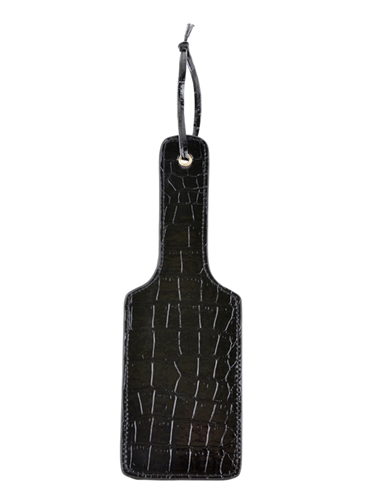 One crack of this firm Paddle and your subject will know who's in charge. Deliver some serious playtime punishment with one swift whack or indulge in the smooth black croc textures to tease and caress your lover between spankings. It never hurt so good.