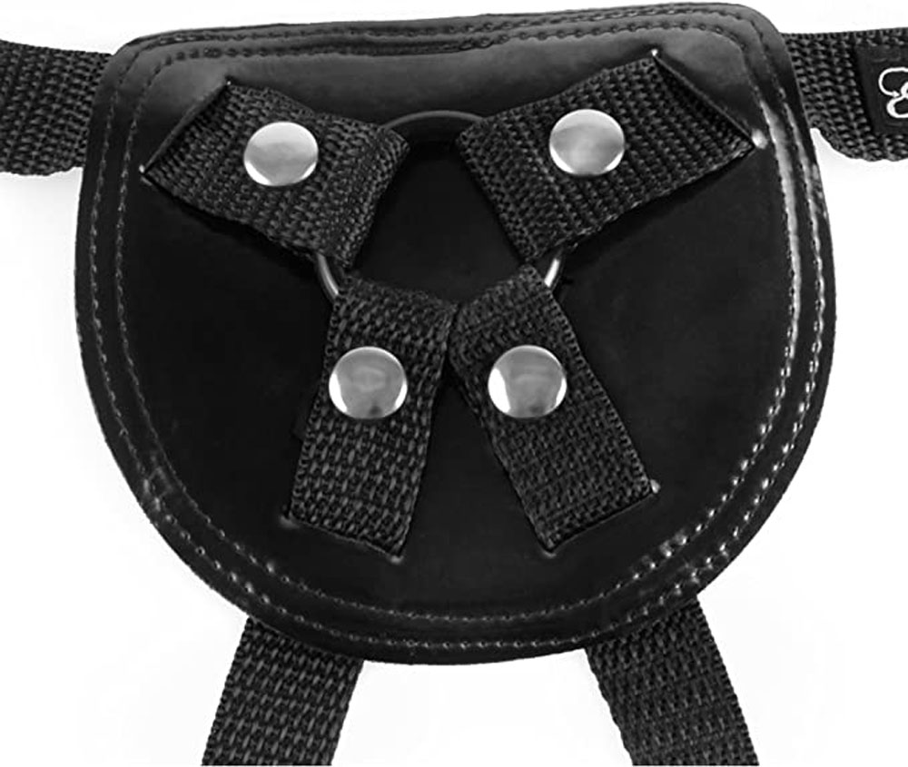 Perfect for first-timers Stay-Put Harness is made with a soft neoprene backside that prevents chafing and feels great against your skin while the shiny patent outside is sleek and inviting. The durable 4-way adjustable nylon straps feature easy plastic slides for the perfect fit on waists up to 44-inches and thighs up to 40-inches. The low-rise fit is super comfortable while the four metal snaps secure the O-ring and hold everything in place even when the action heats up. Three included silicone O-rings allow you to interchange a range of dildos with a diameter up to 2-inches.