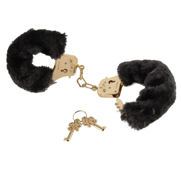 Secure your lover with these luxurious Deluxe Furry Cuffs. The gold metal cuffs are lined with velvety-soft faux fur to keep your  lover comfortably restrained. Made to play hard the cuffs connect with heavy-duty hardware to ensure your lover wont escape any time soon.