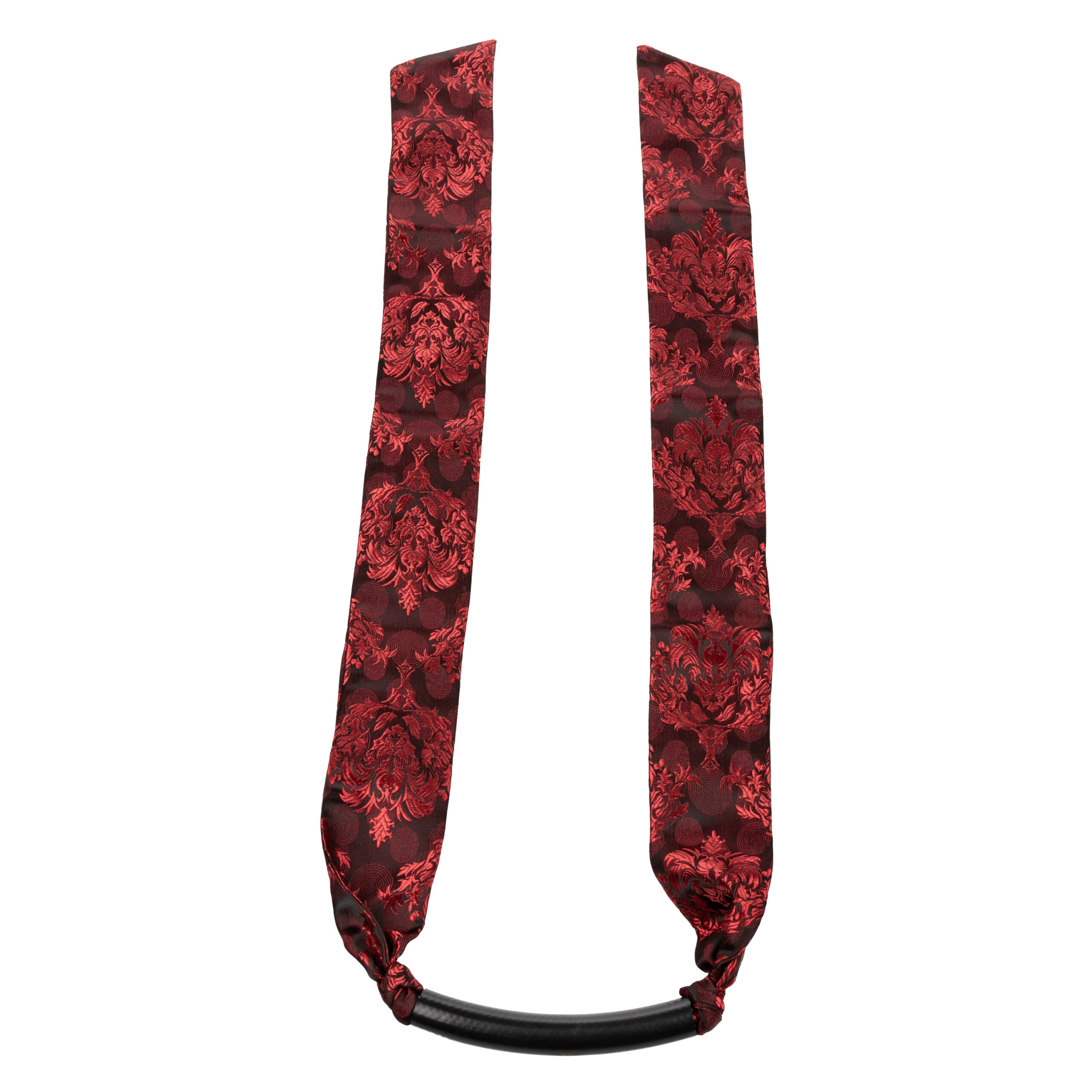 The Scandal Bar Gag provides an incredibly naughty and sensual way to explore those secret desires. The firm yet pliable bar makes wearing the gag comfortable without sacrificing the bliss of communicating only through your squeezing hands